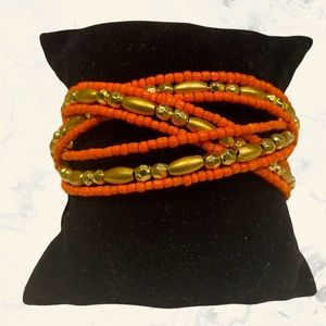 Fun and flirty orange and gold beaded wrap bracelet- easy on and off